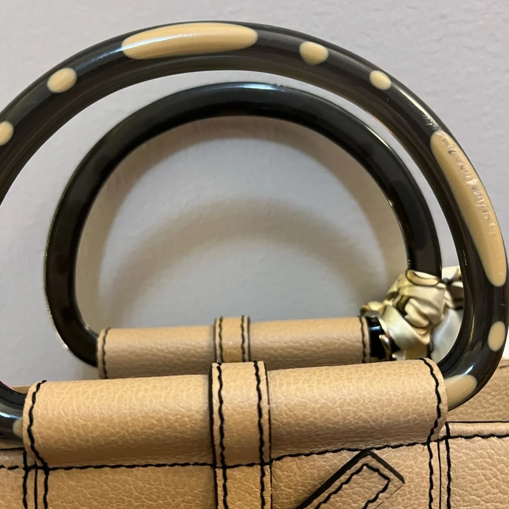 Tan leather tote with acrylic handles by Christine deGennaro